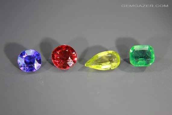 Garnet-topped Doublet colour set, 4 faceted gems. 2.72 carats total weight.  ** SOLD **