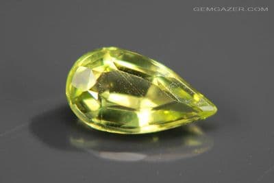 Garnet-topped Doublet, lime green faceted.  0.82 carat.  ** SOLD **