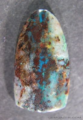 Gem Silica with Cuprite cabochon, Arizona USA.  30.51 carats.