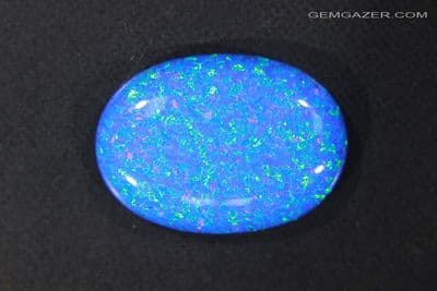 Gilson blue Opal simulant cabochon, France. 11.50 carats. (Video)