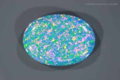 Gilson blue Opal simulant cabochon, France. 11.87 carats. (Video)