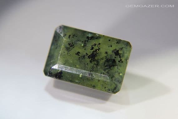 green dendritic Opal, faceted Peru 5.49 carats.