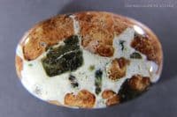 Hessonite Garnet in Wollastonite cabochon, Peru. 202.68 carats.