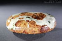 Hessonite Garnet in Wollastonite cabochon, Peru. 202.68 carats.