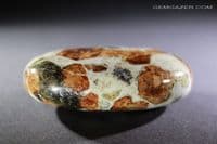 Hessonite Garnet in Wollastonite cabochon, Peru. 202.68 carats.