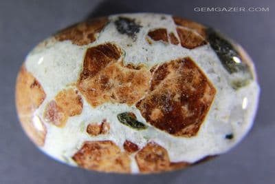 Hessonite Garnet in Wollastonite cabochon, Peru. 202.68 carats.