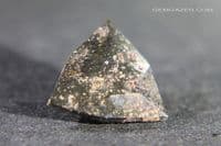 Impactite, faceted, Morocco.  6.42 carats.