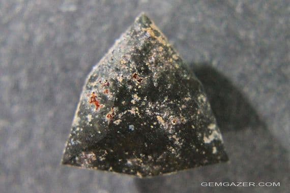 Impactite, faceted, Morocco.  6.42 carats.