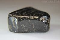 Jet, polished specimen, Whitby, Yorkshire, UK. 21.28 carats.