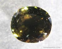 Kornerupine, brownish-green faceted, Sri Lanka.  5.54 carats.
