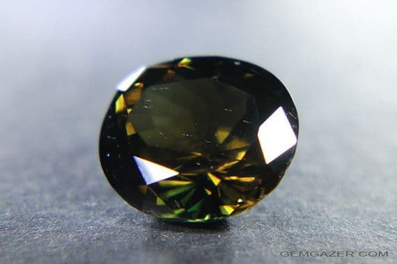 Kornerupine, brownish-green faceted, Sri Lanka.  5.54 carats.