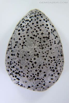 Lava cabochon, Indonesia. 37.99 carats.