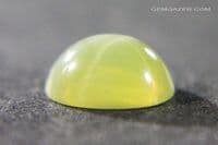 Linde olive green synthetic star Sapphire cabochon. 1.83 carats.  ** SOLD **