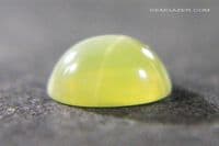 Linde olive green synthetic star Sapphire cabochon. 1.83 carats.  ** SOLD **