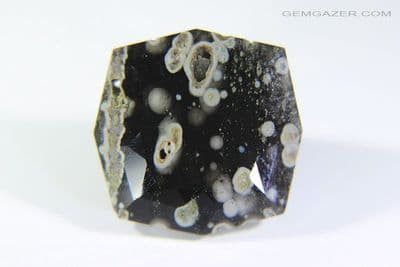 Lipari Obsidian, aka Cosmic Obsidian, faceted, Italy.  7.24 carats.