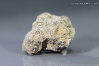 Lunar Meteorite fragment, Morocco. 0.927 grams (display case included).