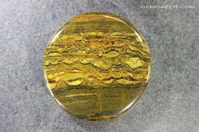 Marra Mamba Tiger's-eye Quartz cabochon, Australia. 121.31 carats. (Video)