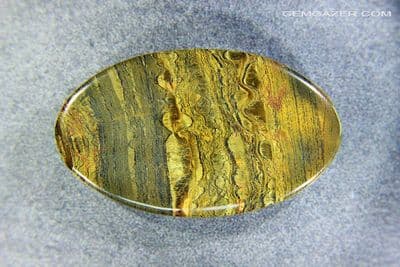 Marra Mamba Tiger's-eye Quartz cabochon, Australia. 126.30 carats. (Video)