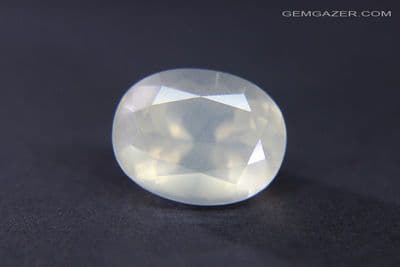 Moonstone, yellow green faceted with silver sheen, India. 6.36 carats (Video).