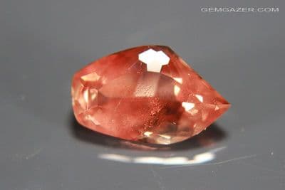 Oligoclase orange-red copper Sunstone with schiller, faceted, Oregon, USA. 4.27 carats. (Video)