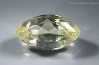 Oligoclase Sunstone, pale peach-yellow with pink schiller, faceted, Mexico. 8.52 carats.