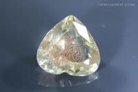 Oligoclase Sunstone, pale peach-yellow with pink schiller, faceted, Oregon, USA. 2.73 carats.