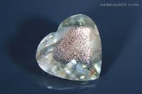 Oligoclase Sunstone, pale peach-yellow with pink schiller, faceted, Oregon, USA. 2.73 carats.