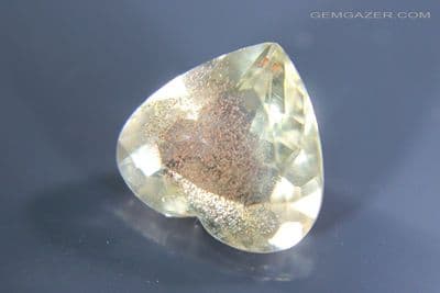 Oligoclase Sunstone, pale peach-yellow with pink schiller, faceted, Oregon, USA. 2.73 carats.