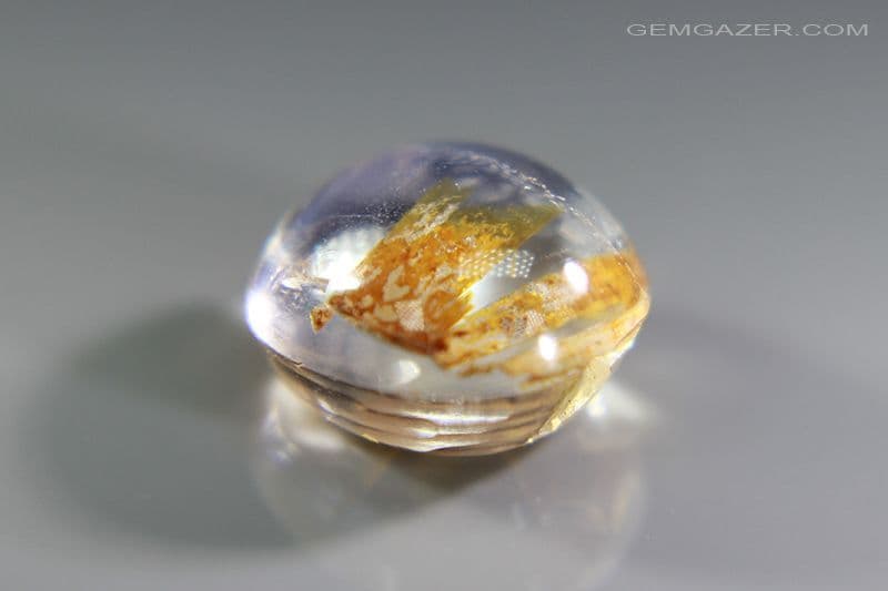 Orthoclase Moonstone cabochon with blue sheen & tube-like