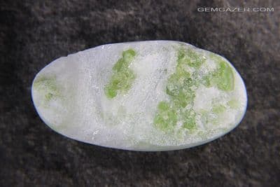 Pargasite crystals in Feldspar cabochon, Vietnam. 220.56 carats.