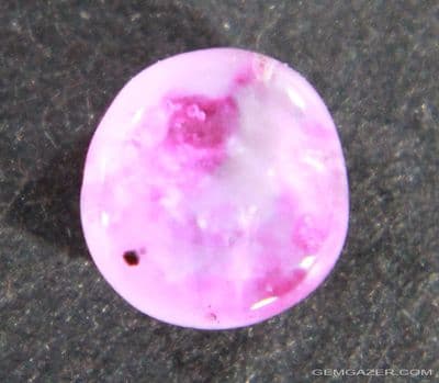 Parti-colour Ruby cabochon, Myanmar.  1.09 carats.