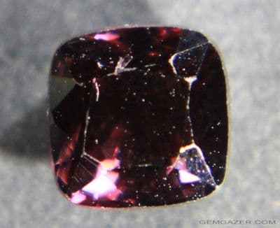 Pinkish-maroon Spinel, faceted, Myanmar.  1.37 carats.