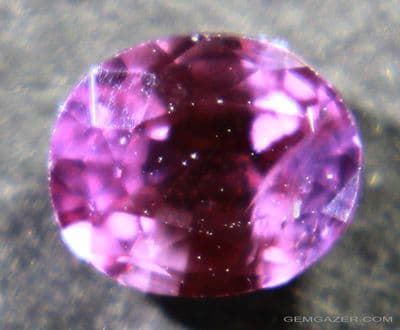 Pinkish-purple Sapphire, faceted, Madagascar.  0.62 carat.  ** SOLD **