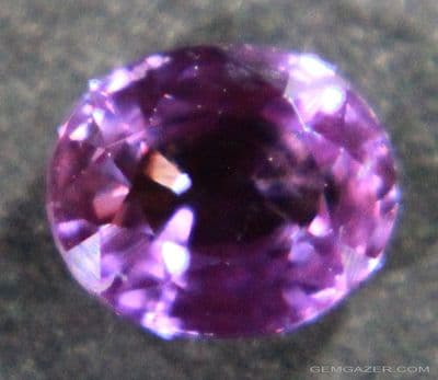 Pinkish-violet Sapphire, faceted, Tanzania.  0.60 carat.  ** SOLD **