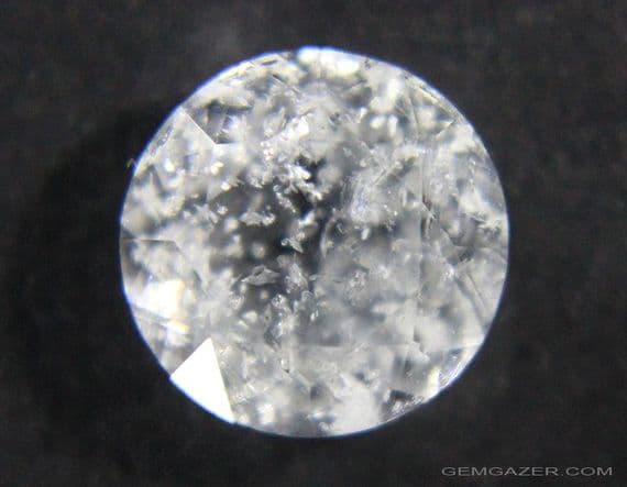 Pollucite with Polylithionite inclusions, faceted, Pakistan.  1.31 carats.