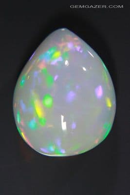 Precious Opal cabochon, Ethiopia. 9.02 carats. (Video)