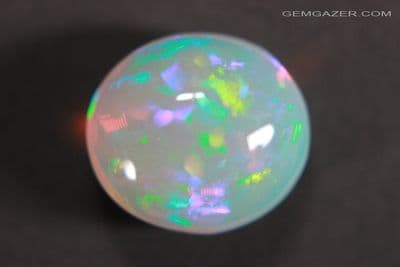 Precious Opal cabochon, Ethiopia. 9.57 carats. (Video)