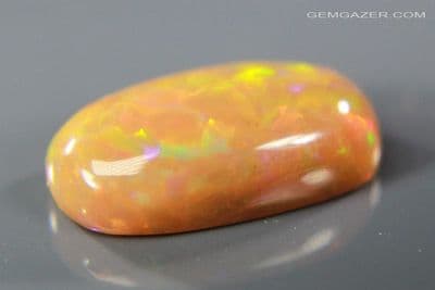 Precious Opal cabochon, honey-orange, Ethiopia. 3.64 carats. (Video)  ** SOLD **
