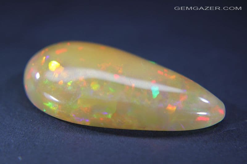 2 OPALES JAUNES ET MULTICOLORES D' ETHIOPIE : 6.8-7 mm x 4.8-5 mm