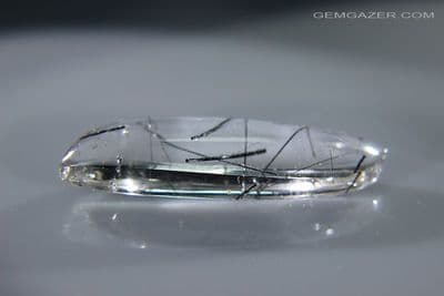 Quartz cabochn with Tourmaline crystal inclusions, Brazil. 28.34 carats.