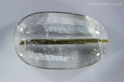 Quartz cabochn with Tourmaline crystal inclusions, Brazil. 80.50 carats.
