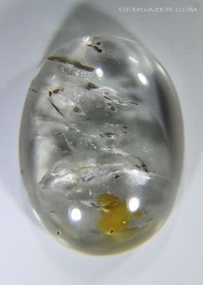 Quartz cabochon with Biotite Mica inclusions, Brazil. 23.14 carats.