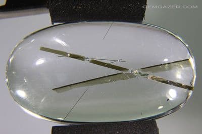 Quartz cabochon with Biotite Mica inclusions, Brazil. 59.96 carats. (Video)