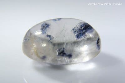 Quartz cabochon with blue Fluorite crystal inclusions, Madagascar. 7.56 carats.
