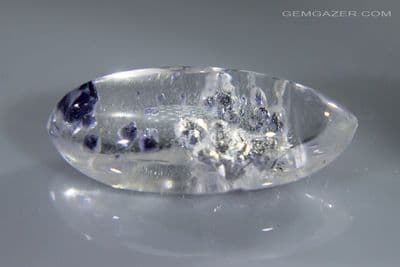 Quartz cabochon with blue Fluorite crystal inclusions, Madagascar. 8.06 carats.