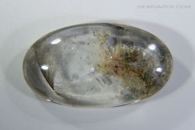 Quartz cabochon with Brookite & Lodolite inclusions, Brazil. 10.77 carats.