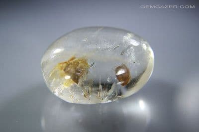 Quartz cabochon with Calcite cube inclusions. Brazil. 17.06 carats.