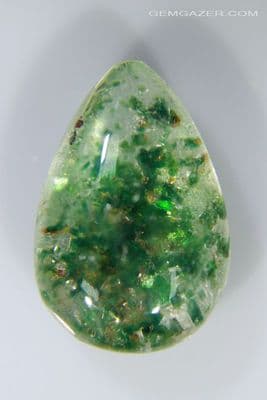 Quartz cabochon with Chlorite crystal inclusions, Madagascar. 11.81 carats.