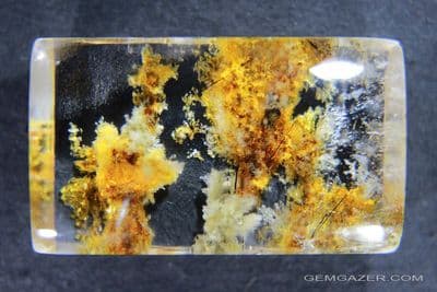 Quartz cabochon with Clay (Lodolite) inclusions, Brazil.  62.18 carats.