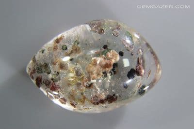 Quartz cabochon with Clinochlorite & Ripidolite inclusions, Brazil. 37.49 carats.